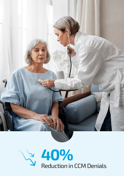 Doctor listening to a seated older woman's chest with a stethoscope in a living room