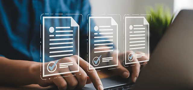 Person typing on a laptop with three floating digital documents showing checkmarks