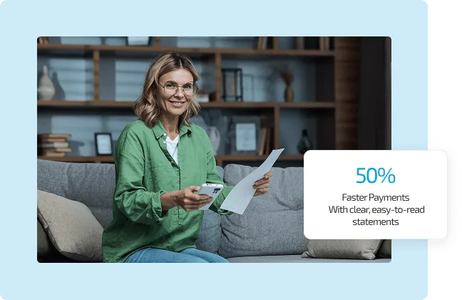 patient-statements image 60578 webp Smiling woman in green shirt sitting on a sofa holding a phone and a printed statement