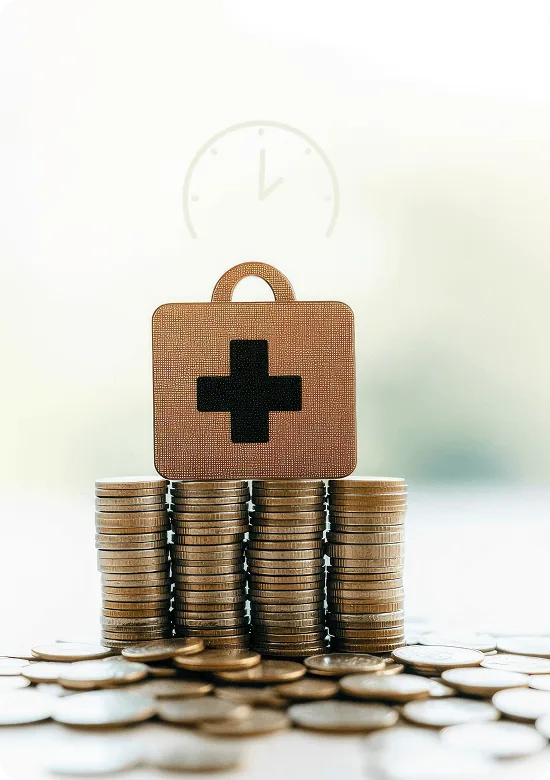 rpa-medical-billing image 62193 webp Medical first aid case on stacks of coins with a faint clock outline behind