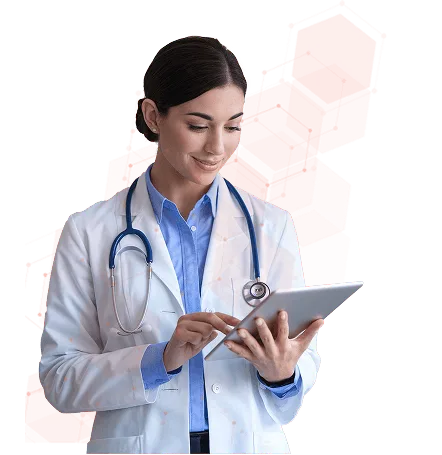 Smiling doctor in a white coat and stethoscope using a tablet