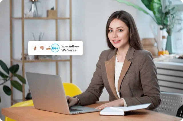 specialities image 61619 webp Woman in a brown blazer sitting at a desk with a laptop and notebook